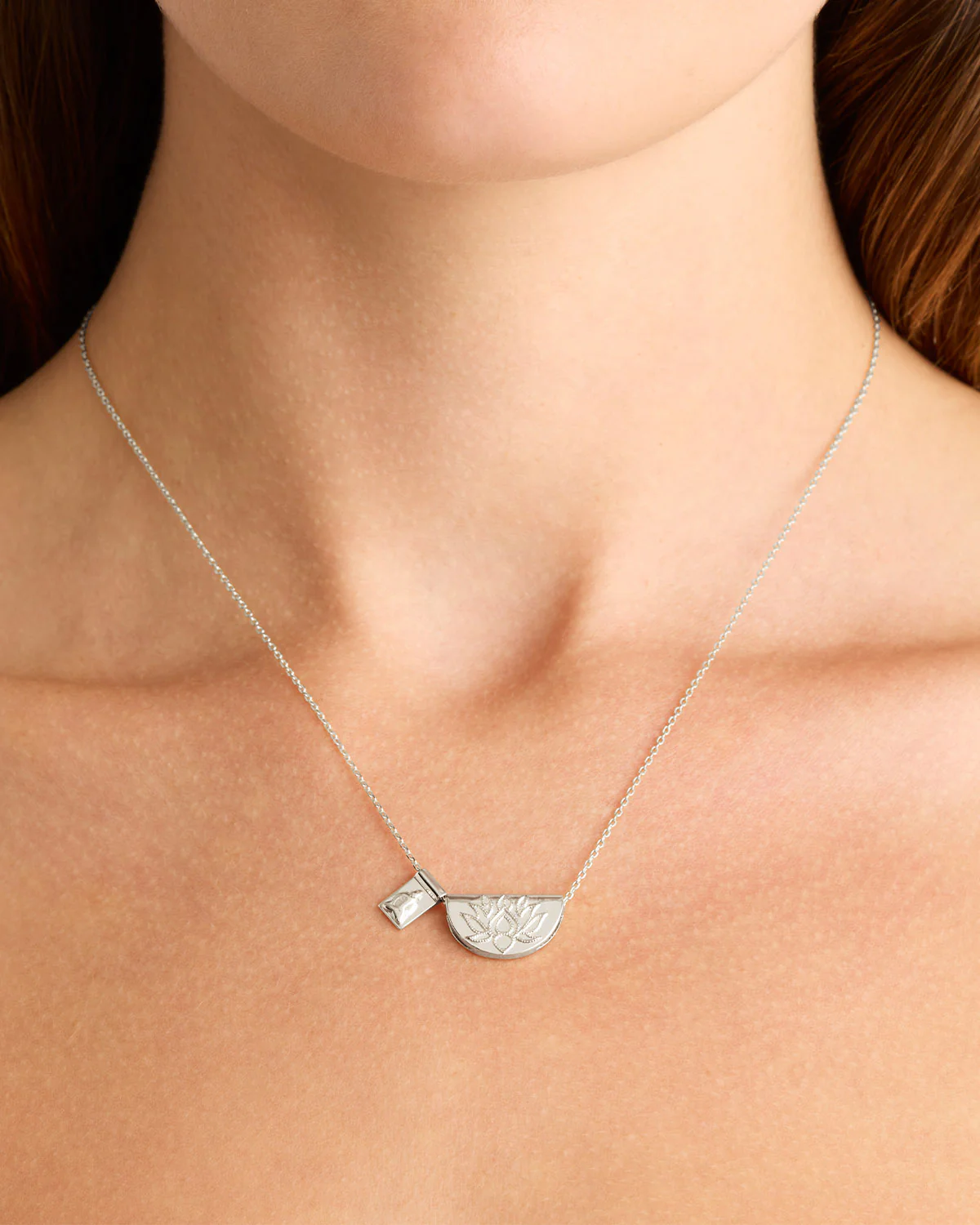 1811-sterling-silver-lotus-and-little-buddha-necklace-2.webp Sterling Silver Lotus and Little Buddha Necklace